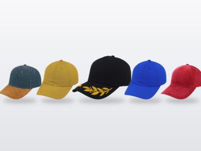 A range of branded caps supplied by Lite Active in Zimbabwe – chambray and suede, mustard, black 5-panel with gold wreath embroidery, royal blue and red corduroy